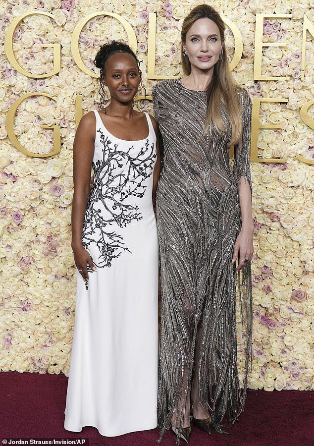 Angelina Jolie, 49, was proudly supported by her teenage daughter, Zahara, 19, as the duo glammed up at the 82nd Annual Golden Globe Awards in Beverly Hills on Sunday