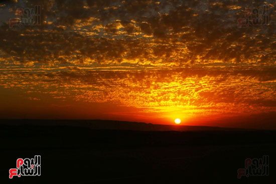 الشفق الأحمر فى سماء القاهرة يعكس سحر الطبيعة