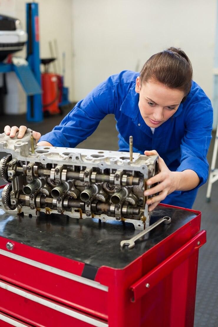 mechanic-working-engine_13339-83325.jpg