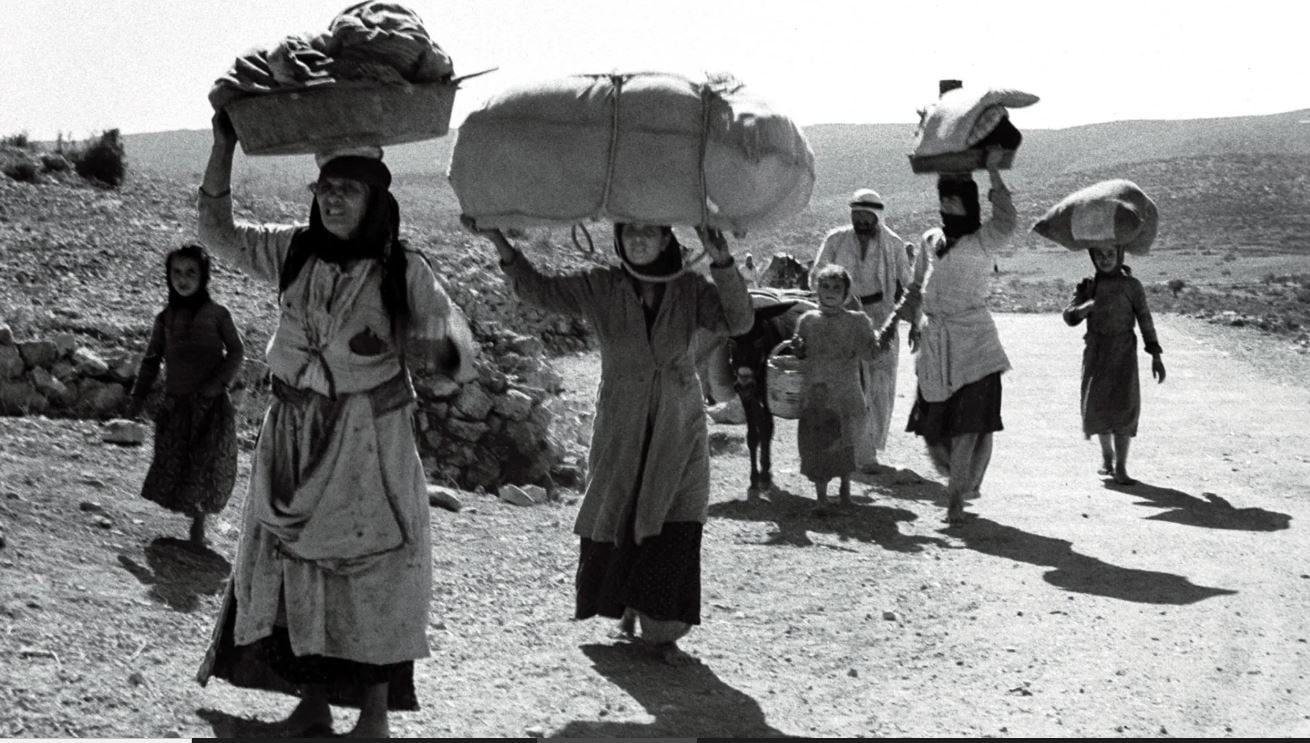 نساء فلسطينيات على طريق التهجير نساء فلسطينيات على طريق التهجير