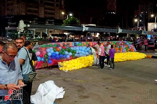 تجهيز بالونات العيد بساحة المسجد (1) تجهيز بالونات العيد بساحة المسجد (1)