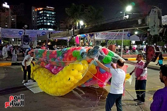 تجهيز بالونات العيد بساحة المسجد (3) تجهيز بالونات العيد بساحة المسجد (3)