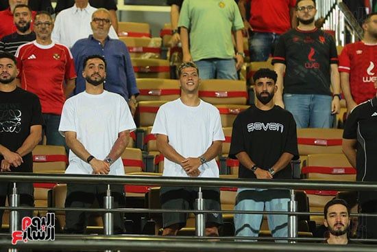 مروان وإمام وعبد المنعم من مدرجات الأهلى