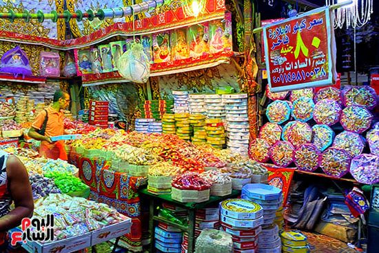 ملبن حبل وحمصية وفولية.. محلات بيع حلوى المولد تزين شوارع القاهرة (10)