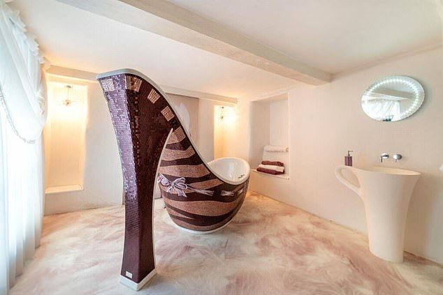 Well-heeled: The owner of this Conwy home added a touch of glamour to the bathroom
