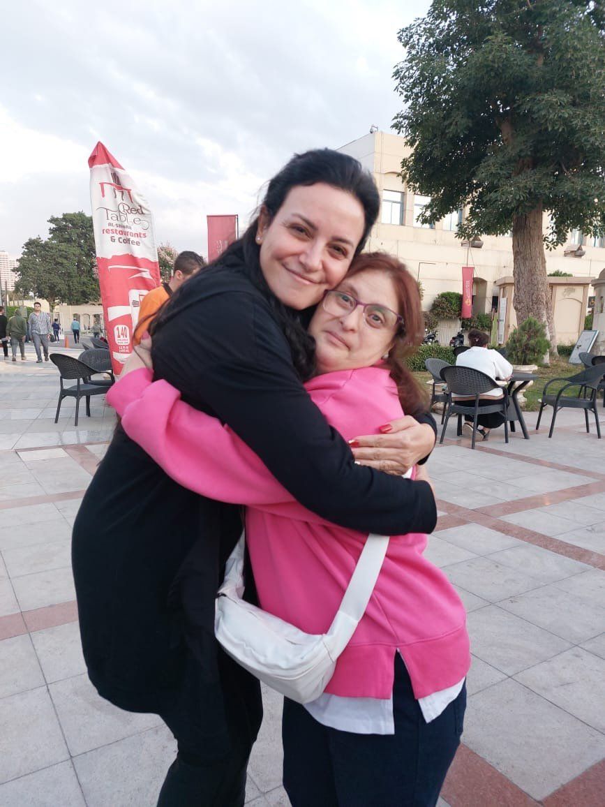 ريهام عبد الغفور مع سيدة مصابة بمتلازمة داون ريهام عبد الغفور مع سيدة مصابة بمتلازمة داون