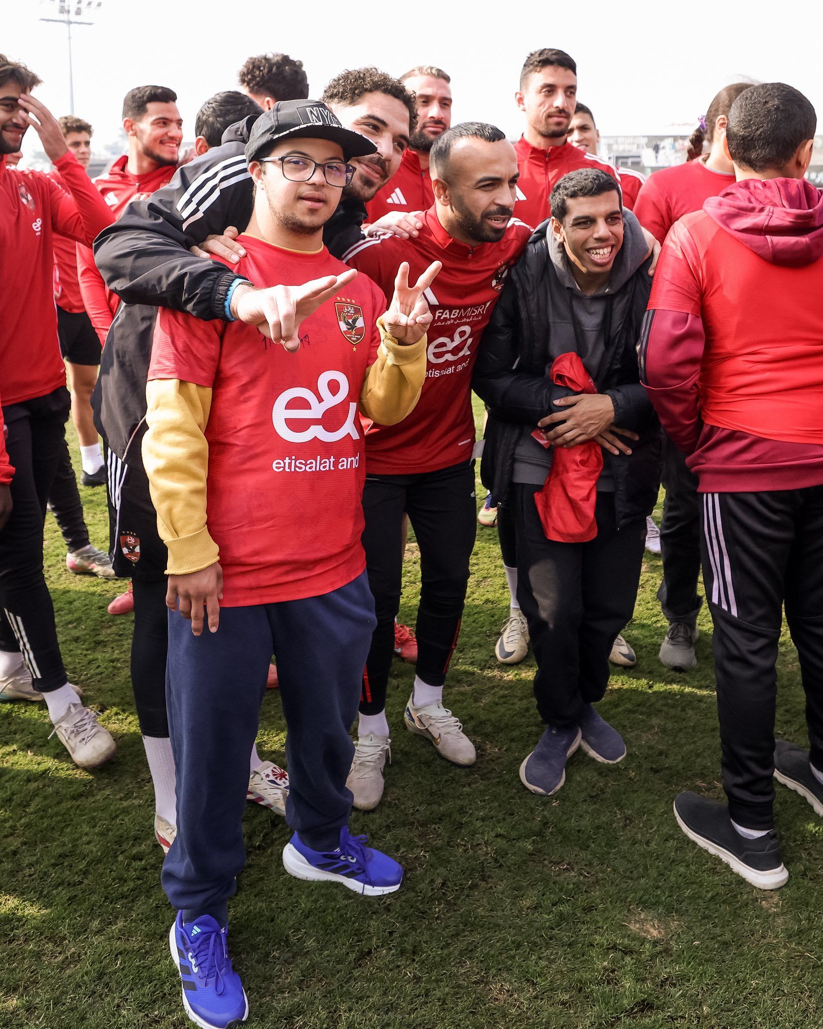 لاعبي الاهلي وذوي الهمم لاعبي الاهلي وذوي الهمم