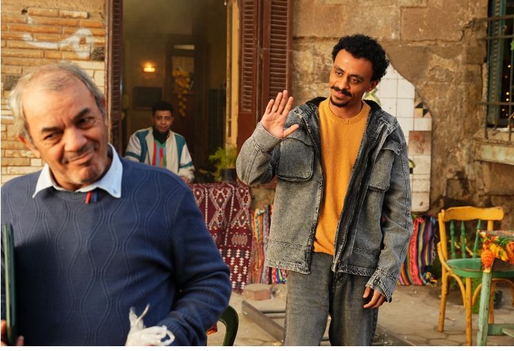 كزبرة وعلاء مرسى