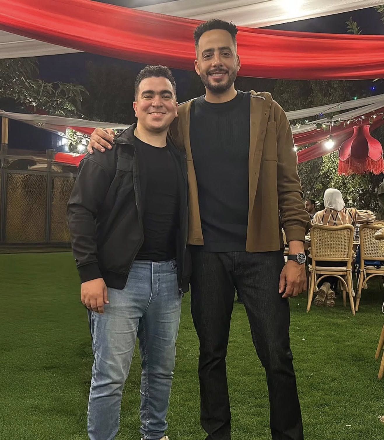 عصام السقا ومصمم الجرافيك دولا