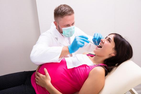 تدبير المرأة الحامل في طب الأسنان