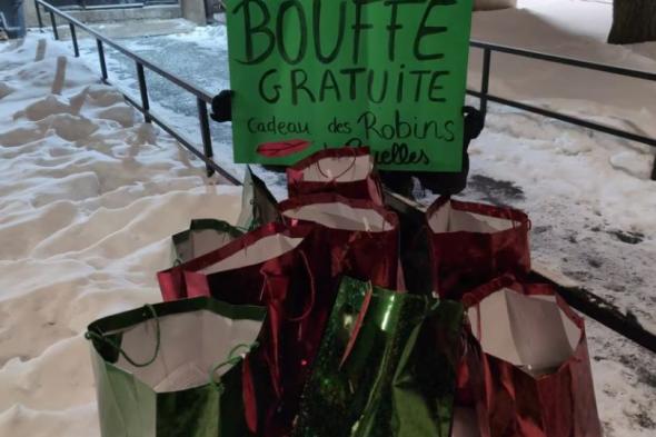 عشرات في زي "روبن هود" يسرقون متاجر ويوزعون المسروقات على المحتاجين